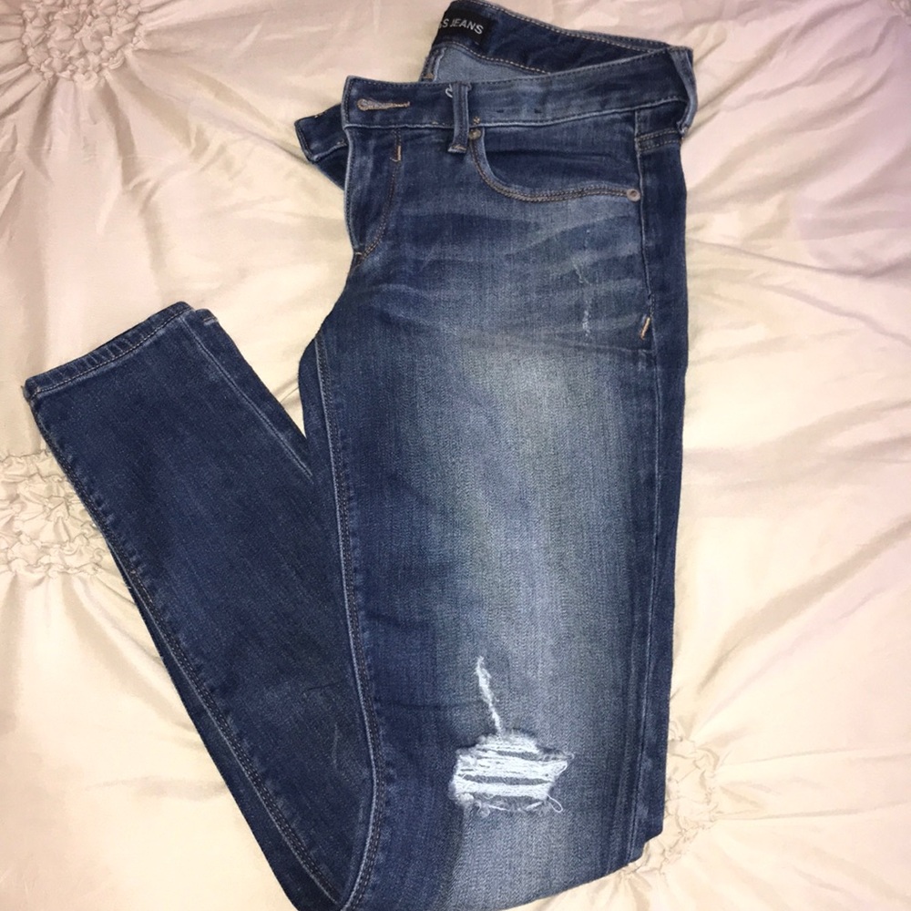 Express low rise distressed jean legging. Size 4.